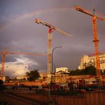 A rainbow over construction site