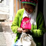 Lady preparing fabrics to be tainted