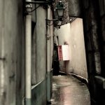 Narrow street and pink mailboxe